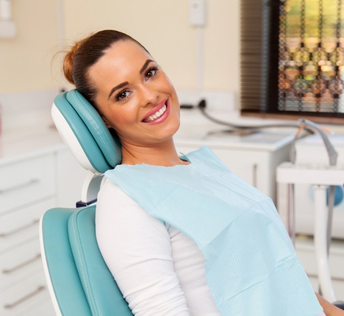 Woman at family dentistry appointment for dental checkup and teeth cleaning