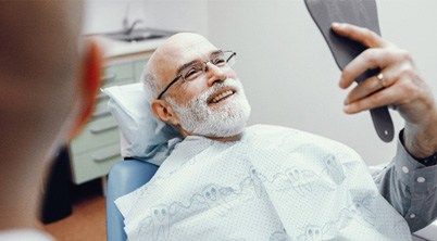 Man smiling at the dentist
