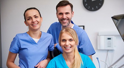 Smiling team of dental professionals