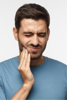 Man in pain before wisdom tooth extraction